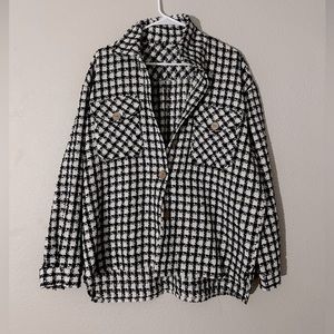 A cute button up, never worn.